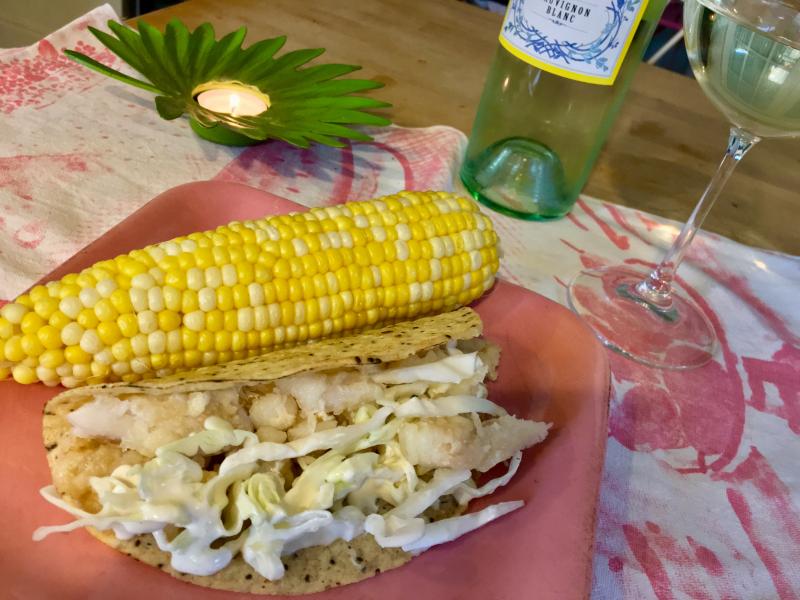 Fish tacos, corn on the cob, and Sauvignon Blanc make for a delightful dinner. SUZI THAYER/Boothbay Register