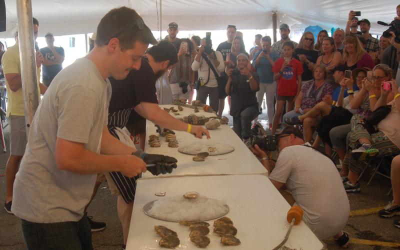 Local favorite Brendan Parsons prepares to shuck. ART MAYERS/Boothbay Register