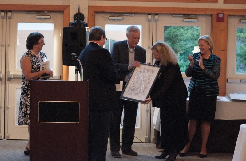 Holly Stover, fourth from left, receives the Citizen of the Year Award from Senator Angus King at the Chamber event. Courtesy of Sara Moore