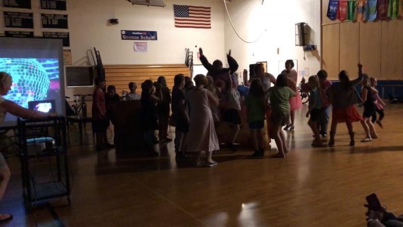Tess and some students dance. PAGE BROWN/Boothbay Register
