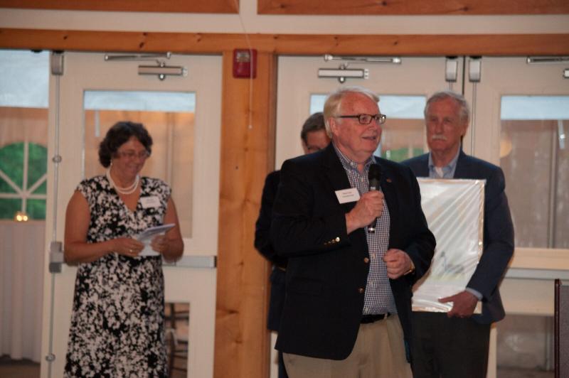 Sean Lewin accepts the Community Service and Improvement Award presented to The Community Center. Courtesy of Sara Moore