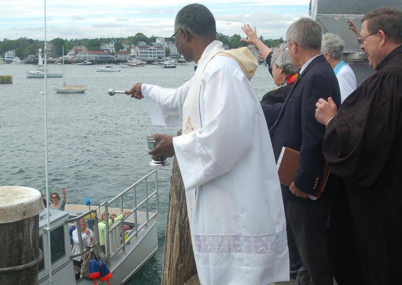 Clergy bless the parade of fishing boats. ART MAYERS/Boothbay Register
