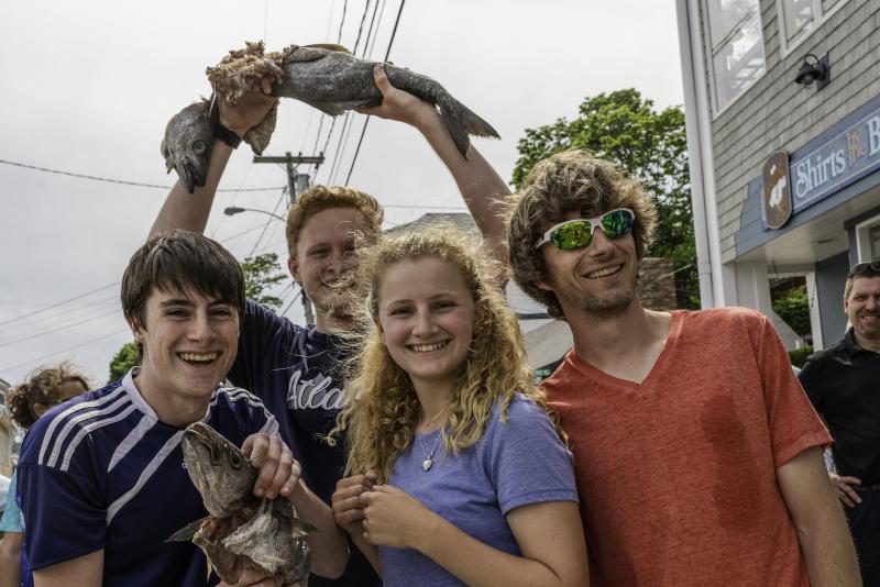 Boothbay Region High School track team members and their coach took first place in the 2018 Fish Relay Race during Windjammer Days on June 27. From left are Will Perkins, Aaron Densmore, Kelly Clarkson and coach Nick Scott. Jim Newton photo