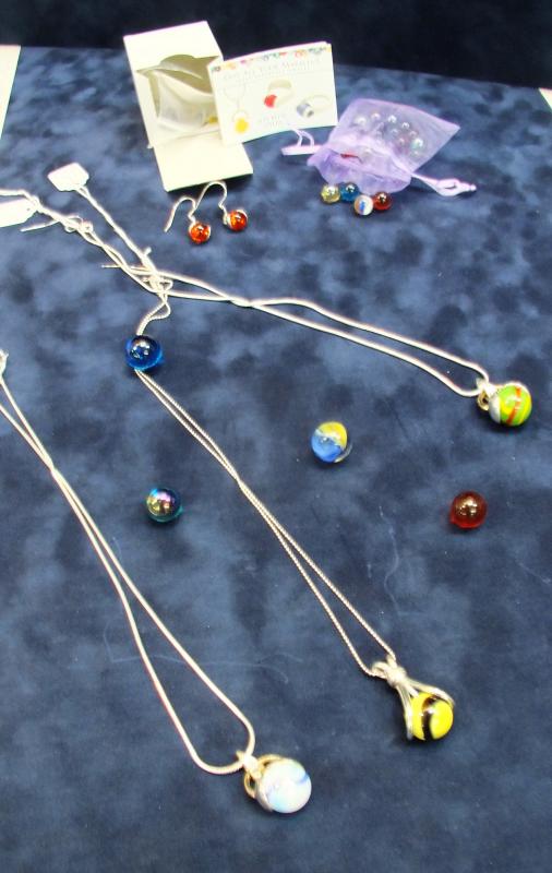 Got All Your Marbles? earrings and pendants at Boothbay Harbor Framers & Gallery. LISA KRISTOFF/Boothbay Register