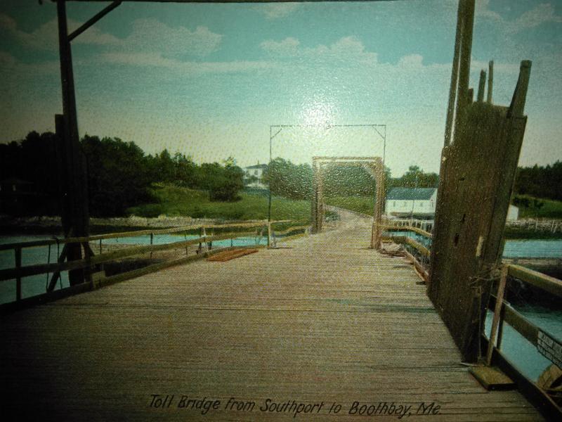 The old Southport toll bridge, 1921. The Lewis home can be seen just to the right of the wooden bridge. Courtesy Duane and Dwight Lewis.