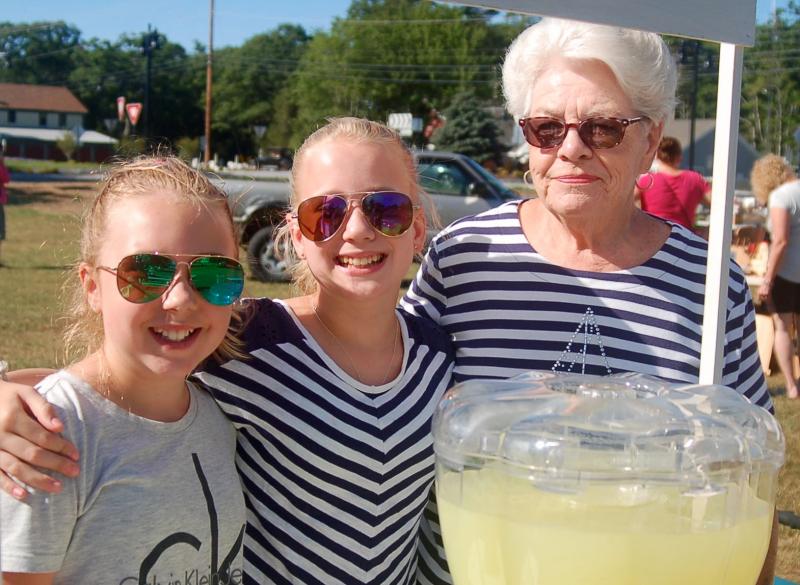 Magen Burge and Lily Nein, pictured with Sue Burge, sell lemonade to benefit homeless veterans ART MAYERS/Boothbay Register