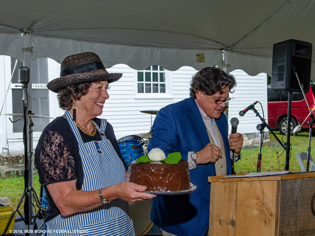 Wendy Ross Eichler displays a “Two in One Dessert,” that sold for a record-breaking $1,000 through the deft efforts of auctioneer Kaja Veilleux of Thomaston Place Auction Galleries. Bob Bond photo
