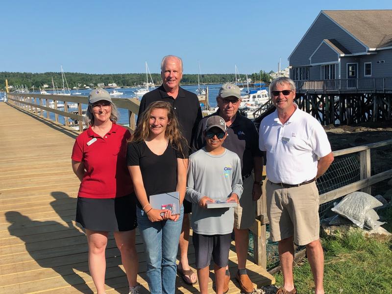 Hometown sailors qualify for national championships. Pictured from left are, front row, sailors Ella Beauregard and Hamilton Barclay; back row: BHYC Officers Liz Rettenmier, Gardiner Rapaleye, Lee Krow and Rob Wheeler. Courtesy of Charles Barclay
