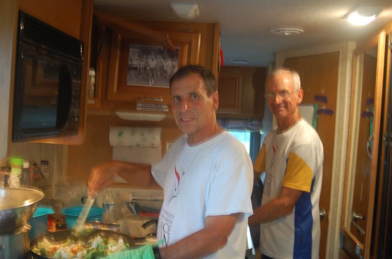 Arpan de Angelo and Banshidhar Medeiros prepare dinner in the RV. ART MAYERS/Wiscasset Newspaper
