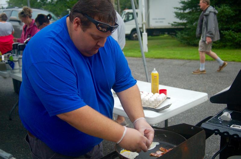 Robbie Watts makes breakfast muffins. ART MAYERS/Boothbay Register