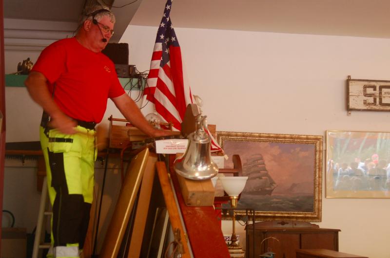 Fire Chief Gerald Gamage opens the auction. ART MAYERS/Boothbay Register