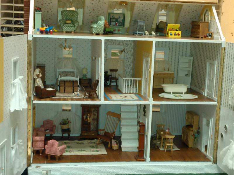 From the children’s playroom to the kitchen rug, Community Center volunteers led by Penny Donovan revitalized the doll house that will be raffled on Oct. 1. JANE CARPENTER/Boothbay Register
