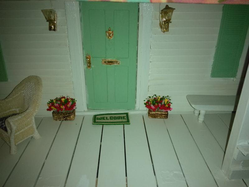 The Community Center’s dollhouse is ready to welcome its new owner, to be chosen in a drawing Oct. 1. JANE CARPENTER/Boothbay Register