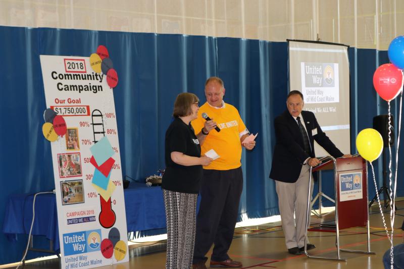 United Way Campaign Cabinet members Chris Szalay of SEARCH (left) and Mark Waltz of Brunswick Police Department (center) present the Campaign's Public Service Division goal to Campaign Chair and Sagadahoc County Sheriff Joel Merry (right) at the Campaign Kick-off. Courtesy of Barbara Reinertsen