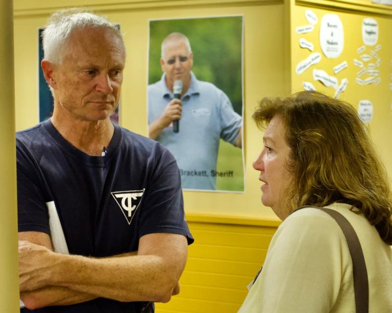 Candidate Laura Fortman, right, was endorsed by EMILY’s List in her race for State Senate District 13. Here, she speaks with South Bristol resident Geoff Bates’s concerns about the future of women’s rights in Maine at the conclusion of the Sept. 26 LCDC meeting. Courtesy photo