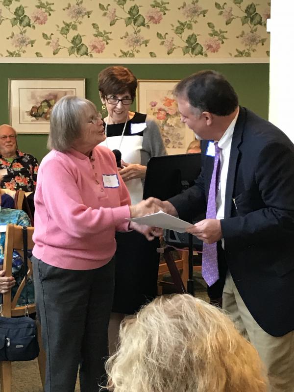 Judy Boyes presents a donation to Scott Shott with Irene Gerney. KELLIE BIGOS/Boothbay Register