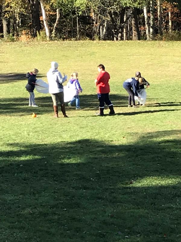 Chasing the hoop. KELLIE BIGOS/Boothbay Register