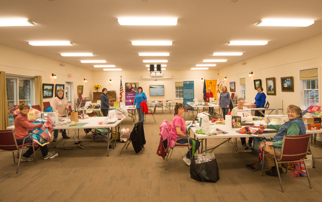 The quilters hard at work in the Rotary Clubhouse. Steve Demeranville photo