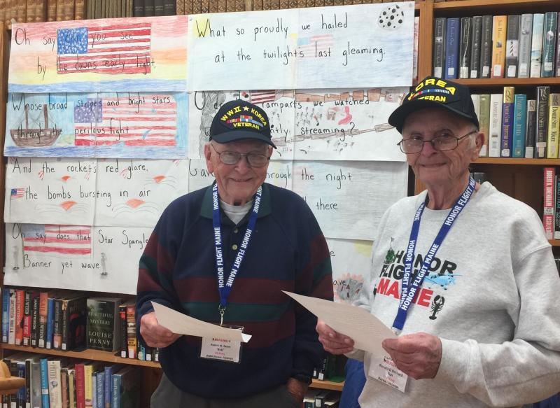 World War II and Korean War veteran Robert Eaton, left, and Korean Vet Ron Orchard talk about their experiences on the Honor Flight Maine to Washington, D.C. Helen Meserve photo