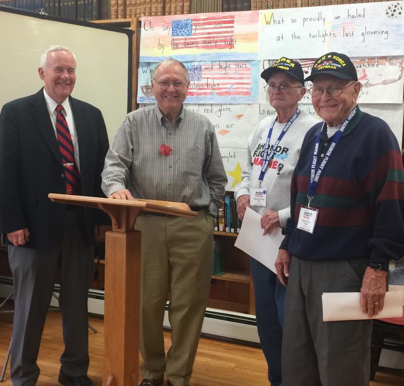 From left, Robert Dent (played taps), Jim Singer (Master of Ceremonies), Ron Orchard (Korean Vet, Honor Flight recipient), Robert Eaton (World War II, Korean War vet, Honor Flight recipient) at Southport Library Aides' Veterans Day Ceremony on Sunday, Nov. 11. Helen Meserve photo