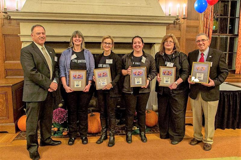 United Way Campaign Chair Joel Merry, left, with the “Loaned Executive” team that worked full time on the Campaign. From left, Lisa Fogg of L.L. Bean, Gina Vickers, Sherri Emery, Cindy Heil of Southport, and John Portela of Local S6 and BIW. Courtesy photo
