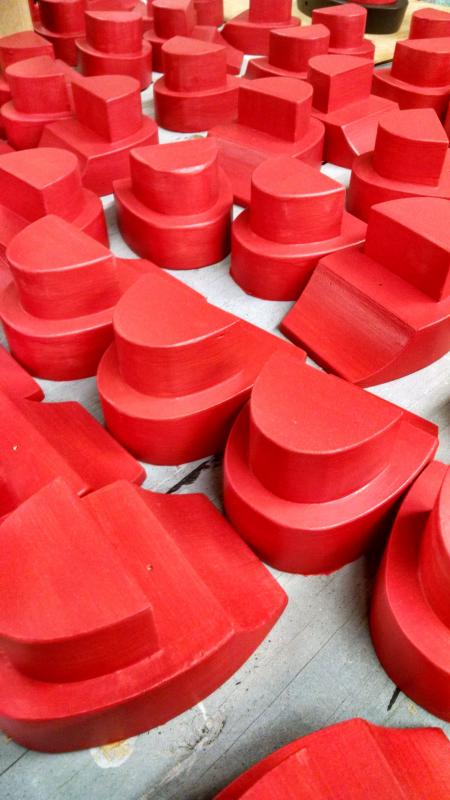 Painted tugboat wheelhouses ready for assembly. MARGARET HOFFMAN/Boothbay Register