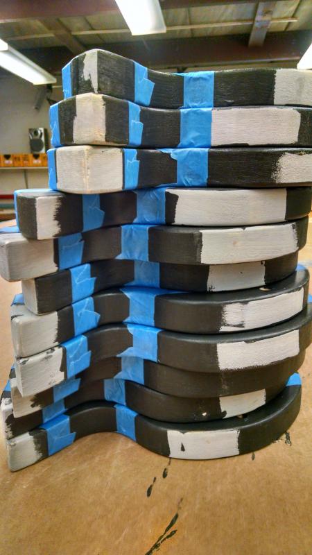 Hodgdon Yacht Services woodworkers Jim Jones, Dave Radtke and painting specialist John LaCharite are the team leaders for the Toys for Tots project and have devised clever assembly line systems to produce the toys. MARGARET HOFFMAN/Boothbay Register
