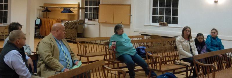 Lincoln County Sheriff Todd Brackett, seated, far left, and Lt. Brendan Kane, patrol division supervisor, second from left, listen to comments about traffic issues from residents Betty Blackman, center, and Heather Abello, third from right, at the Nov. 19 Edgecomb selectmen’s meeting. JANE CARPENTER/Boothbay Register