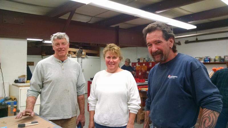 Hodgdon Yacht Services Human Resources Manager Diane Hammond, center, with woodworkers Jim Jones, left, and Dave Radtke at a recent work session. MARGARET HOFFMAN/Boothbay Register