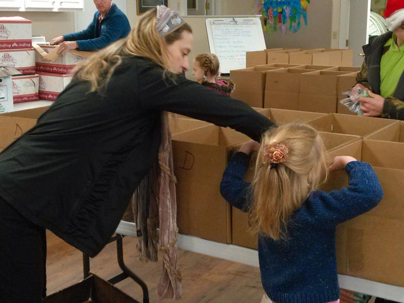 Never too young to learn how to volunteer. JANE CARPENTER/Boothbay Register