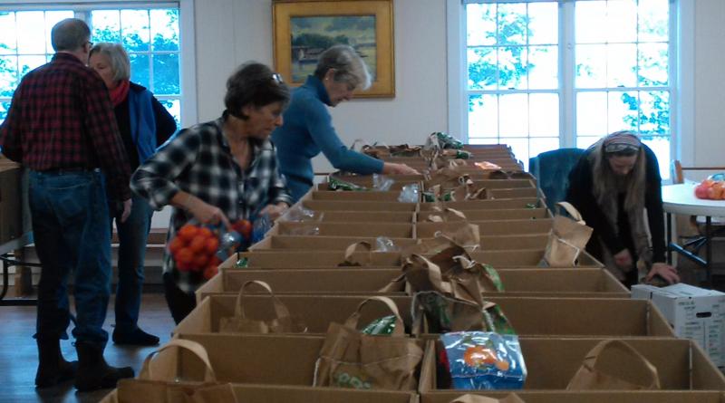 Volunteers hard at work. JANE CARPENTER/Boothbay Register