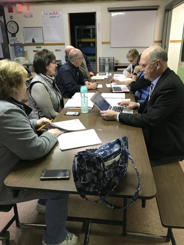 Clockwise from left, Kathy Tibbetts, Principal Lisa Clarke, Dave Benner, Adam Harkins, Jane Hulholland, Lisa Smith (partly hidden) and Superintendent Dr. Keith Laser at the school committee meeting. KELLIE BIGOS/Boothbay Register