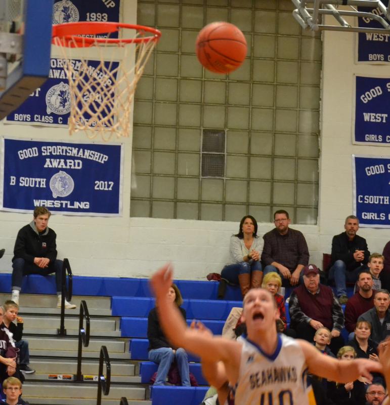Boothbay forward Hunter Crocker jumps for a rebound Dec. 14 as the Seahawks won their third straight game to start the season, defeating Monmouth, 66-63 at Porter Memorial Gymnasium. BILL PEARSON/Boothbay Register