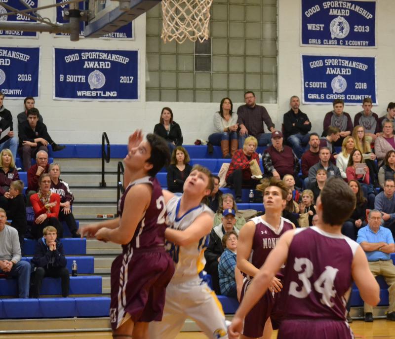 Boothbay forward Nicholas Morley looks for a rebound in the Seahawks’ 66-63 victory over Monmouth. BILL PEARSON/Boothbay Register