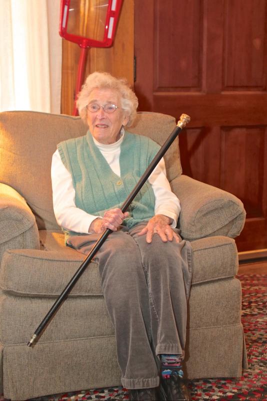 Jean Thompson holds the Boston Post Cane. Robert Mitchell photo