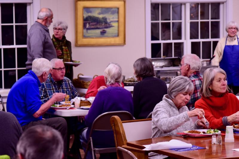 People enjoy the pasta dinner at the Congregational Church on Saturday, Jan. 19, a fundraiser for local Coast Guard families. Bob Crink photo