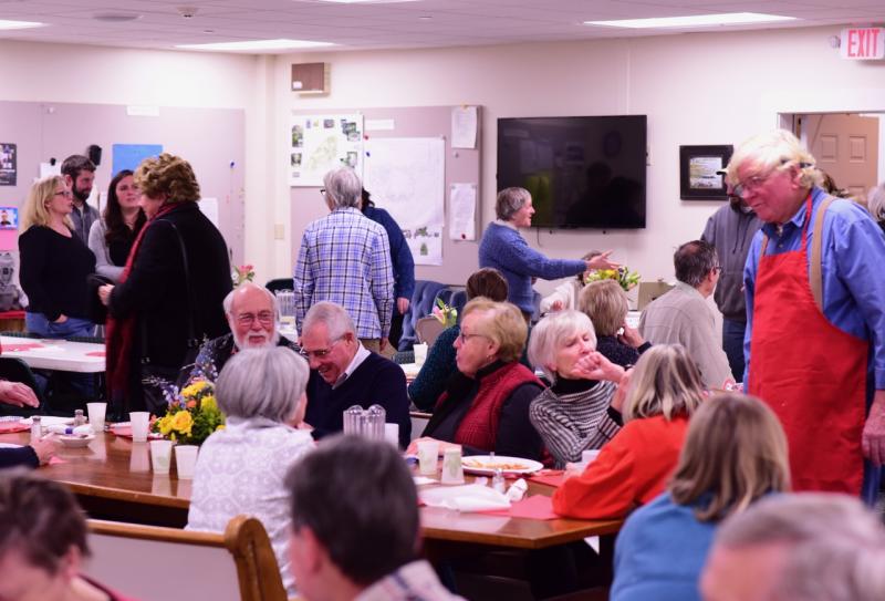 People enjoy the pasta dinner at the Congregational Church on Saturday, Jan. 19, a fundraiser for local Coast Guard families. Bob Crink photo