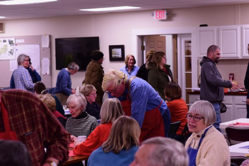 People enjoy the pasta dinner at the Congregational Church on Saturday, Jan. 19, a fundraiser for local Coast Guard families. Bob Crink photo
