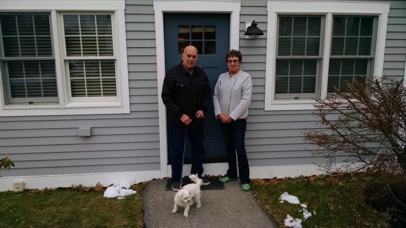 Norman “Tootie” Fogg, left, with his dog Squirt and friend Ruth Watts, right, outside his temporary home provided by the Boothbay Harbor Country Club. MARGARET HOFFMAN/Boothbay Register Norman Fogg, Ruth Watts