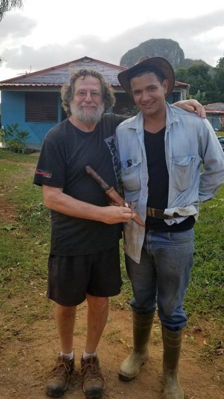 Tracy Moskovitz trades cash and a T-shirt for farmer’s knife. Courtesy photo