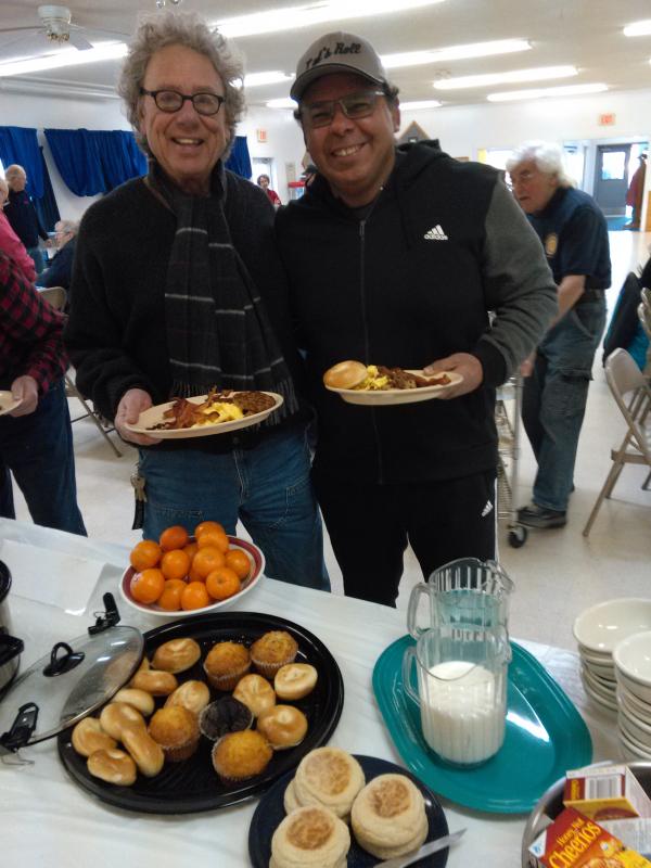 Veteran Barry Sherman, left, and Joe Moreira, famed Jiu-Jitsu practitioner, enjoy the breakfast. JANE CARPENTER/Boothbay Register