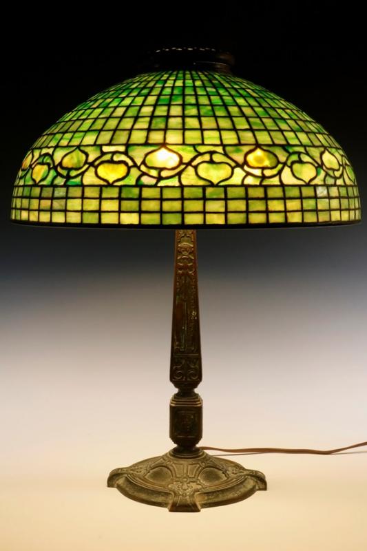 Everyone should have one Tiffany table lamp .. how about this one with Acorn pattern shade 7? Courtesy of Carol Achterhof