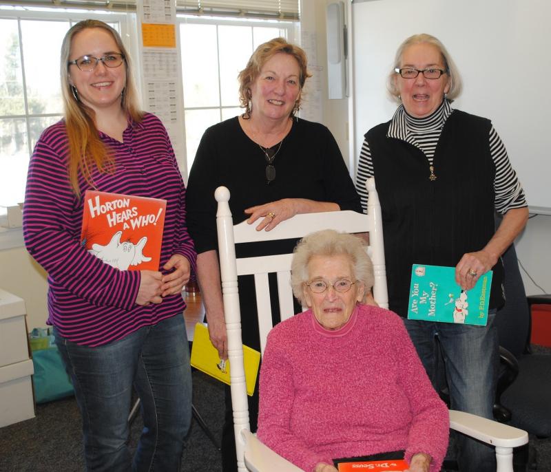 Three generations: Jean Thompson in rocker with, from left, granddaughter Carrie Koskela, and daughters Anne Maher and Marylou Koskela at Southport Central School March 1. Courtesy of Eileen Higgins