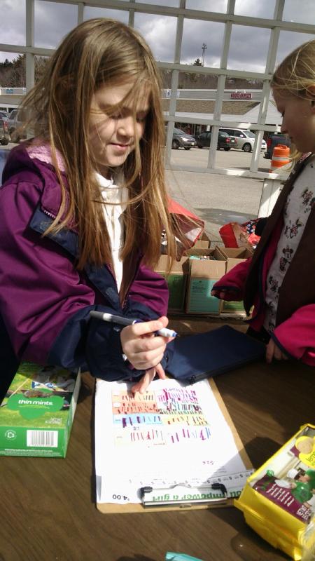 The troop’s recordkeeper, Abby, reported the best sellers were easily Caramel Delights and Thin Mints. MARGARET HOFFMAN/Boothbay Register