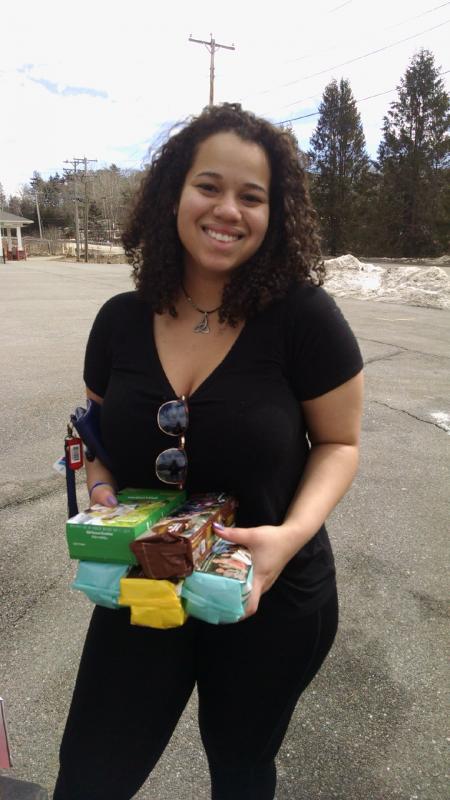 ReAnna Heino of Boothbay Harbor made a specific trip to the sale and went home with five boxes. MARGARET HOFFMAN/Boothbay Register