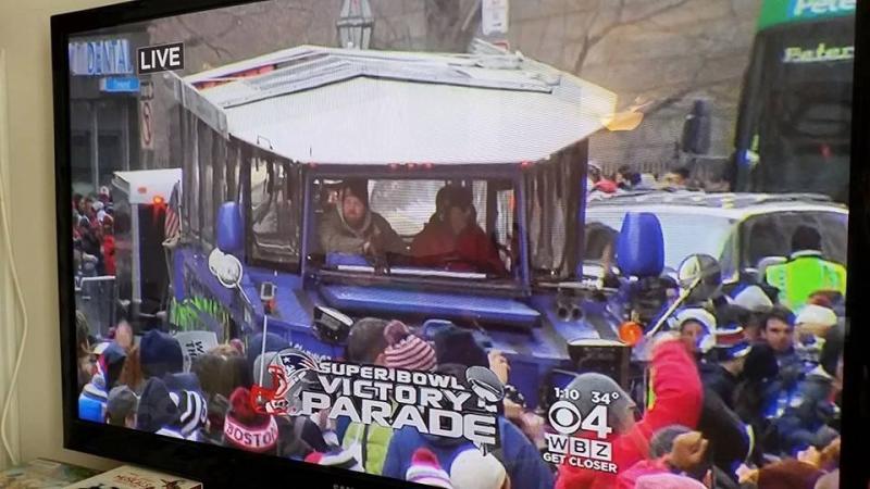 A photo of the television broadcast of the victory parade with Chris Makridis driving the duck boat. Courtesy photo