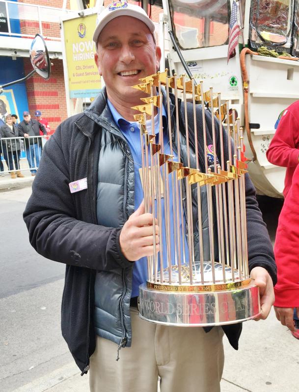 Chris Makridis holds the Red Sox’ World Championship trophy. Courtesy photo