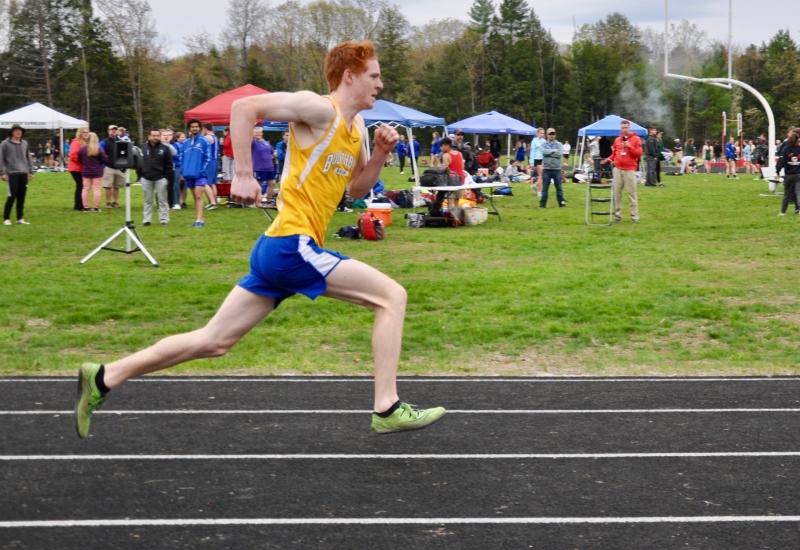 Blake Erhard crushes the 400m dash, earning second place. Courtesy of Kerrin Erhard