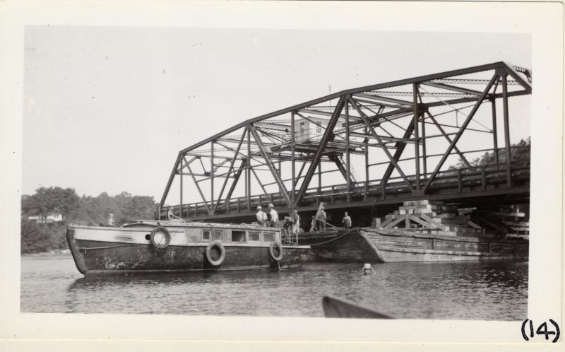 The swingbridge span being floated into place. Courtesy of MDOT historic bridge archives