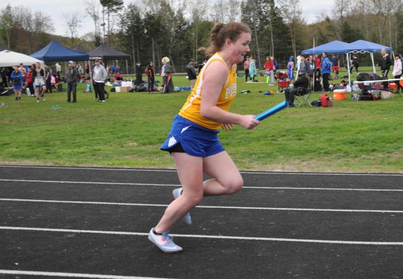 Riley Sullivan pushes through a leg of the 4x400m relay. Courtesy of Kerrin Erhard